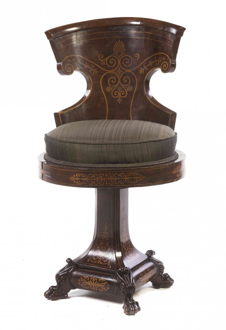 A Louis Phillipe Mahogany Piano Stool, Height 30 3/4 in: A Louis Phillipe Mahogany Piano Stool, having a circular seat and foliate inlay throughout, raised on paw feet. Height 30 3/4 inches.
