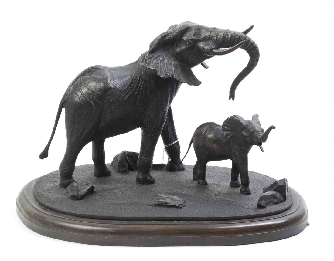 A Kenyan Bronze Figural Group, Tim Nicklin, With 16 1/2: A Kenyan Bronze Figural Group, Tim Nicklin, depicting an elephant with a youth. With 16 1/2 inches. Property from the Estate of Dr. Robert H. Barter, Washington, DC