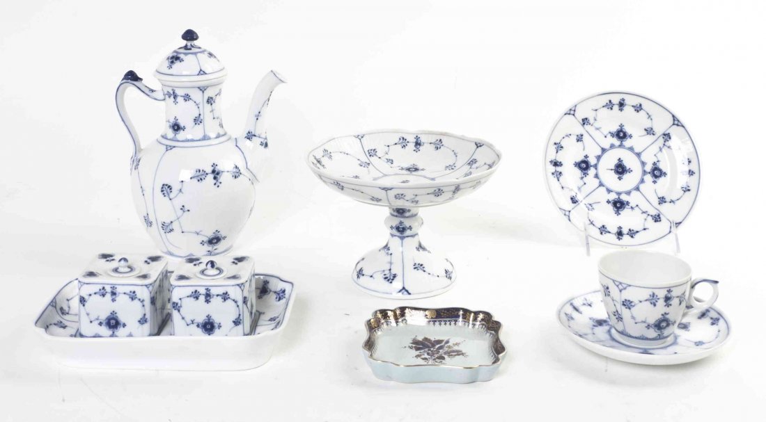 A Set of Royal Copenhagen Dinnerware, Height of tallest: A Set of Royal Copenhagen Dinnerware, in the Half Lace pattern, comprising a teapot, a compote, and others; 19 pieces total. Height of tallest 8 1/2 inches. Property from the Estate of Daniel J. and R