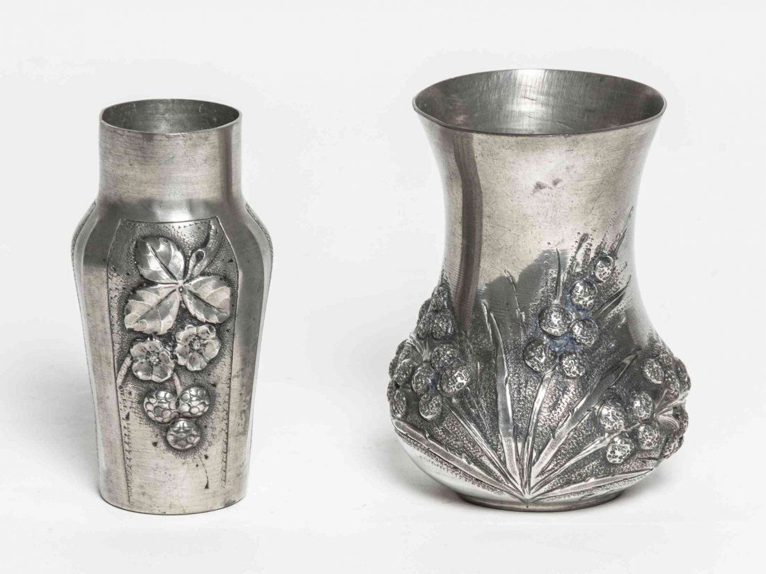 A French Art Deco Pewter Bud Vase, the design by Romain: A French Art Deco Pewter Bud Vase, the design by Romain de Tirtoff Erte (Russian, 1892-1990), of baluster form with raised and engraved floral decoration, signed Erte and stamped Etain Pur Garanti / M