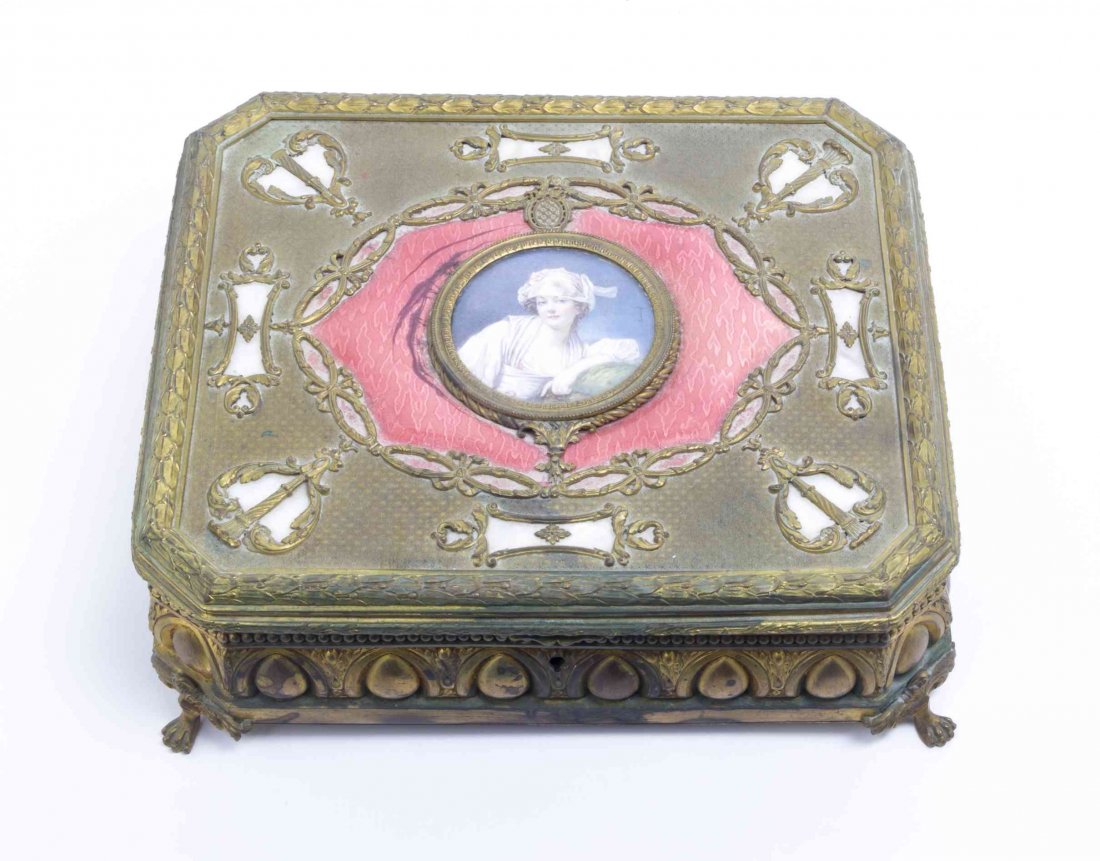 A French Gilt Metal and Mother-of-Pearl Inlay Jewelry: A French Gilt Metal and Mother-of-Pearl Inlay Jewelry Box, early 20th century, of rectangular form centered with a portrait miniature on ivory signed David, opening to a velvet lined interior. Length 