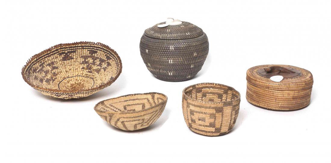 A Collection of Native American Woven Articles,: A Collection of Native American Woven Articles, comprising three baskets with geometric decoration, together with two woven baskets. Diameter of largest 8 inches. Property from the Estate of Mary Blai
