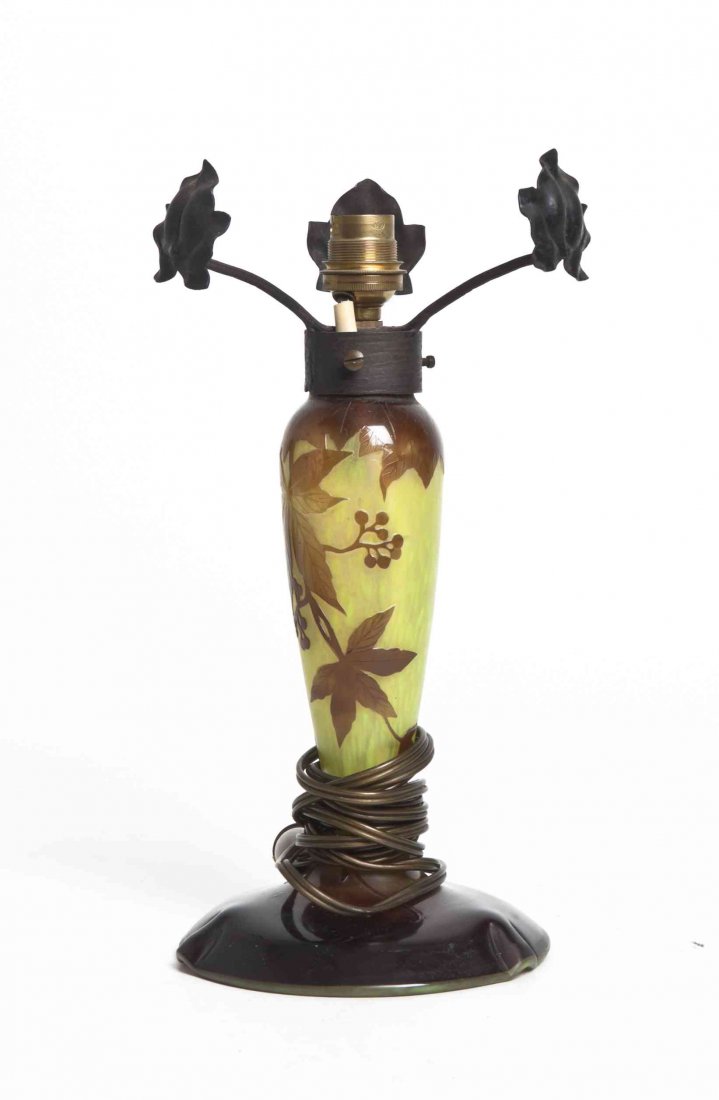 A Delatte Cameo Glass Lamp Base, Height 12 inches.: A Delatte Cameo Glass Lamp Base, of baluster form with berry laden branches on a mottled ground, raised on a circular foot, signed Delatte Nancy in cameo with the Cross of Lorraine. Height 12 inches.
