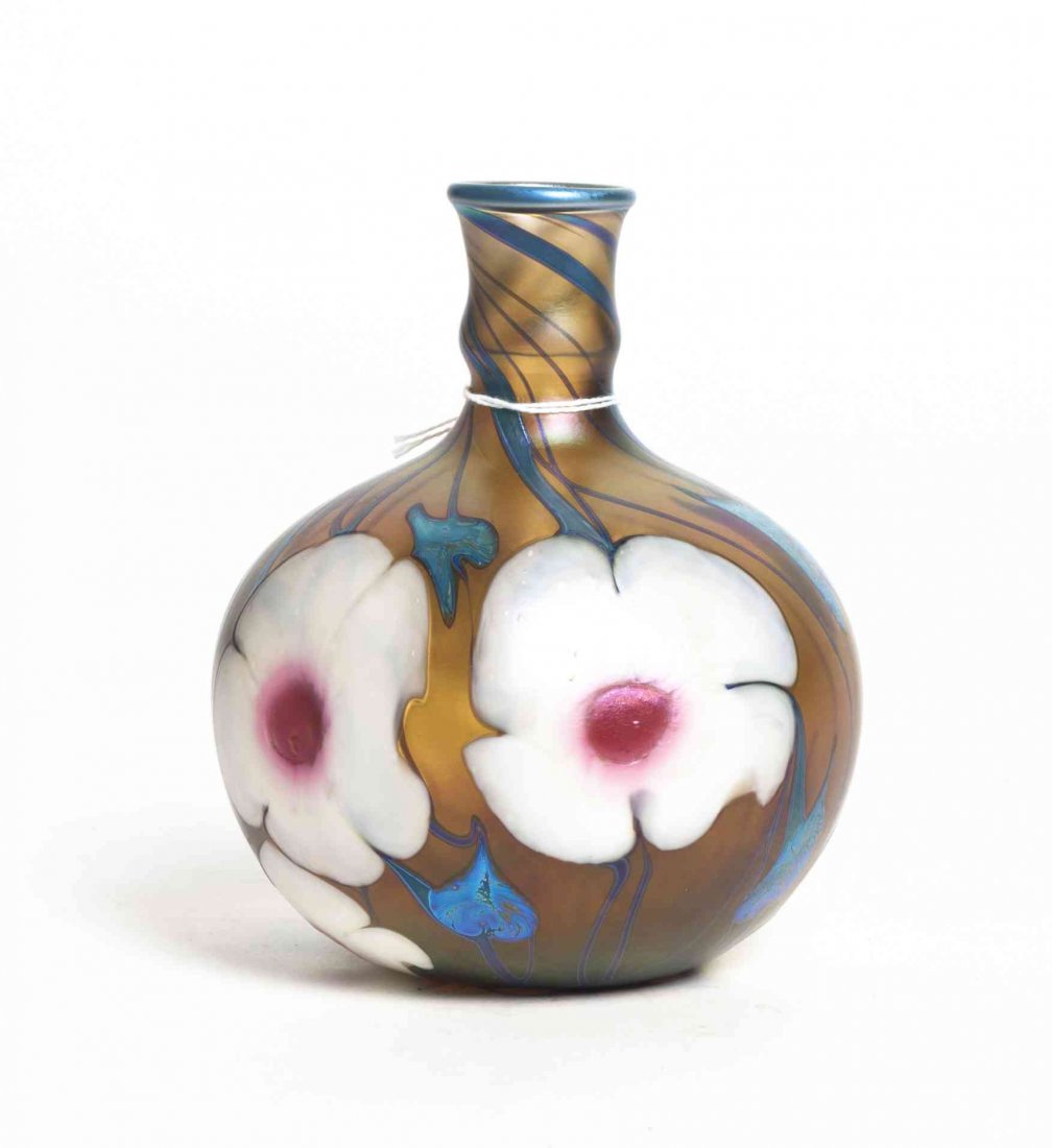 An Iridescent Glass Bottle Vase, Height 5 3/4 inches.: An Iridescent Glass Bottle Vase, with floral decoration on an iridescent gold ground, etched LC Tiffany Favrile A Coll N1815 Height 5 3/4 inches.