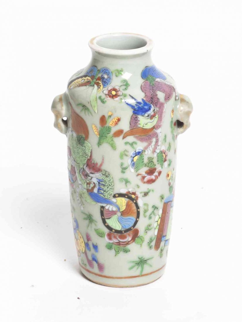 A Chinese Polychrome Enamel Ceramic Vase, Height 5 5/8: A Chinese Polychrome Enamel Ceramic Vase, of baluster form with beast mask handles, depicting temple lions and Buddhist emblems against a celadon ground. Height 5 5/8 inches. Property from the Estate 