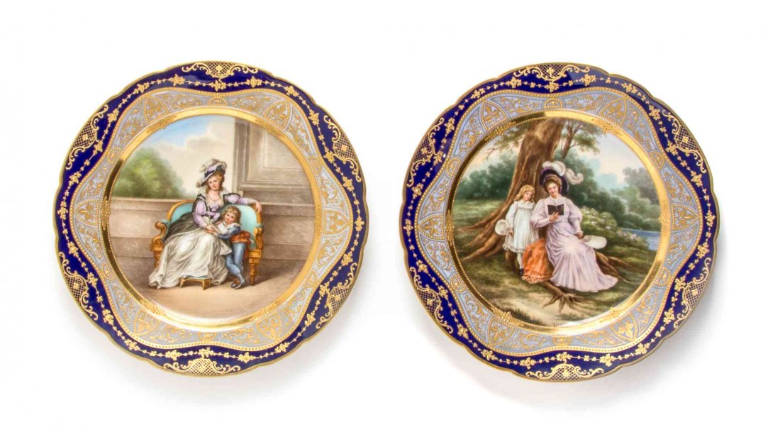 Two German Porcelain Cabinet Plates, Diameter 10: Two German Porcelain Cabinet Plates, LATE 19TH CENTURY, each with cobalt borders and signed Wagner, one depicting a regal woman and son after Francesco Bartolozzi, the other depicting a mother and dau