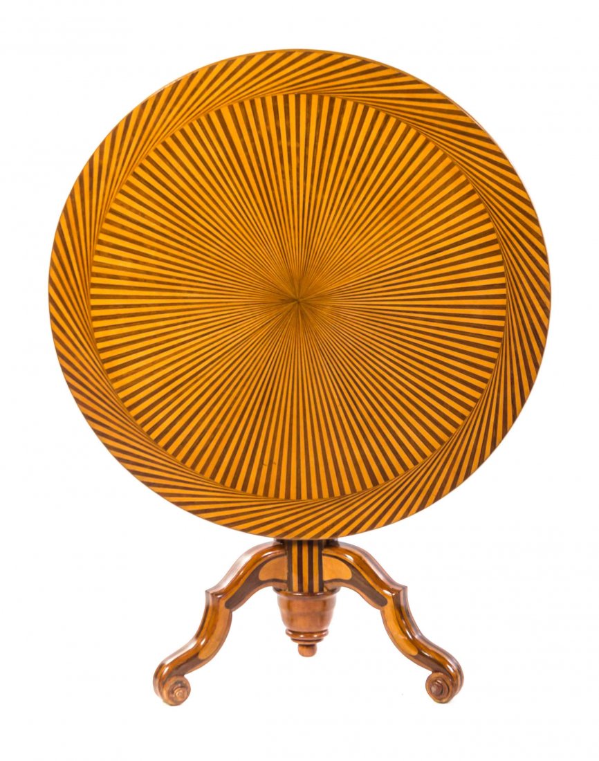A Continental Parquetry Tilt-Top Tea Table, Height 30 x: A Continental Parquetry Tilt-Top Tea Table, having a circular top with radial inlay over an urn form support, raised on tripod base with shaped legs ending in scroll feet. Height 30 x diameter 40 inch