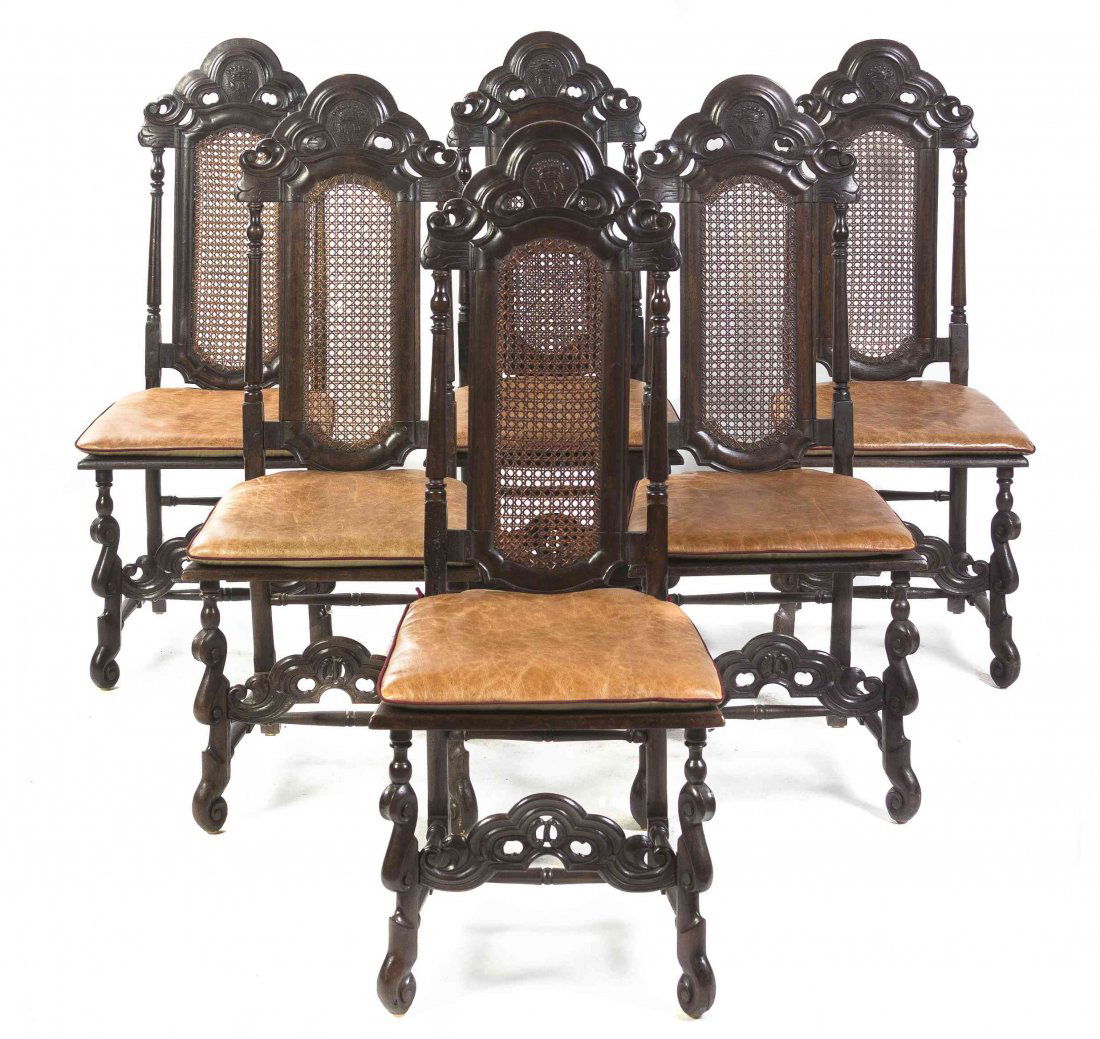 A Set of Ten Danish Beech Side Chairs, Height 45: A Set of Ten Danish Beech Side Chairs, each having a pierce carved crest above a caned back flanked by turned stiles over a caned seat with a leather upholstered seat cushion, raised on carved legs jo