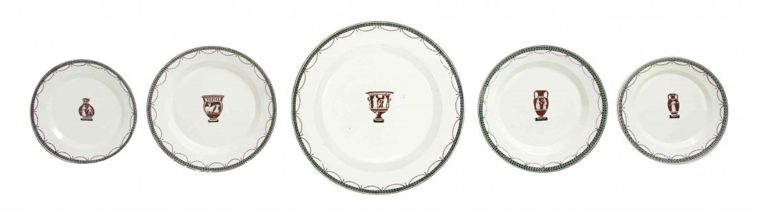 An Italian Creamware Partial Dinner Service, Cherinto: An Italian Creamware Partial Dinner Service, Cherinto Del Vecchio, comprising plates and platters of various sizes; 31 items total. Diameter of largest 10 7/8 inches.