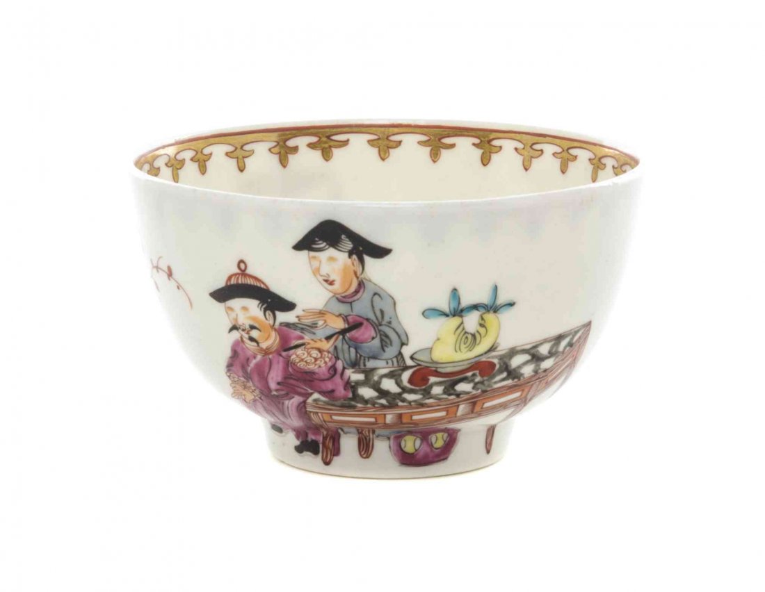 A Worcester Chinoiserie Porcelain Tea Bowl, Diameter 2: A Worcester Chinoiserie Porcelain Tea Bowl, CIRCA 1765, painted to show figures within an interior. Diameter 2 7/8 inches. Property from the Collection of Norman Lippitt, Calgary, Alberta