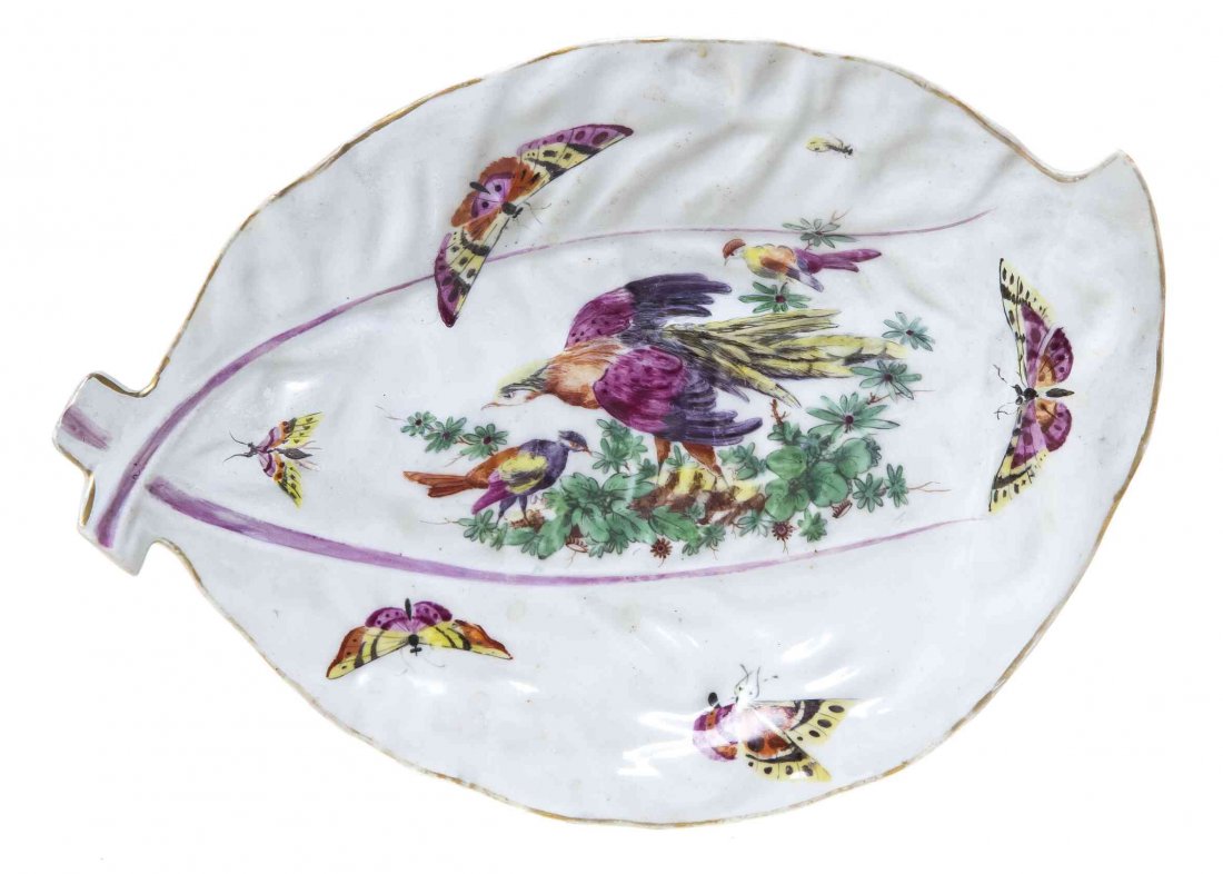 A Worcester Polychrome Porcelain Leaf Form Dish, Width: A Worcester Polychrome Porcelain Leaf Form Dish, CIRCA 1770, painted to show colorful birds and butterflies. Width 10 1/4 inches. Property from the Collection of Norman Lippitt, Calgary, Alberta