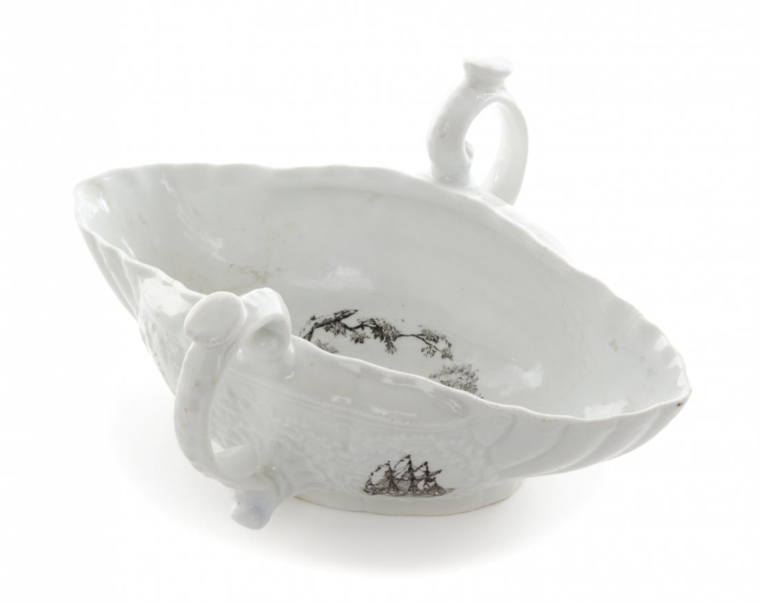 A Worcester Porcelain Twin-Handled Sauce Boat, Length 7: A Worcester Porcelain Twin-Handled Sauce Boat, CIRCA 1755, decorated to show a Robert Hancock River scene, unmarked. Length 7 1/2 inches. Property from the Collection of Norman Lippitt, Calgary, Alber