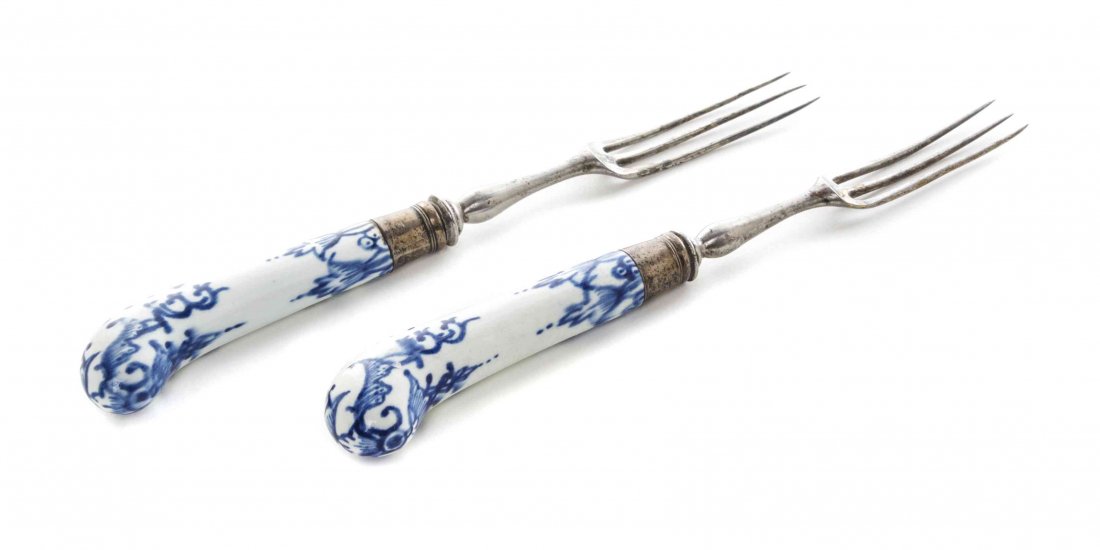 A Pair of Bow Porcelain Forks, Length 8 3/4 inches.: A Pair of Bow Porcelain Forks, CIRCA 1760, each decorated to show floral elements. Length 8 3/4 inches. Property from the Collection of Norman Lippitt, Calgary, Alberta
