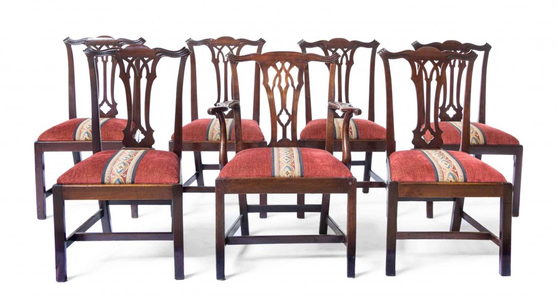 A Set of Seven Chippendale Style Mahogany Dining: A Set of Seven Chippendale Style Mahogany Dining Chairs, comprising one armchair and six side chairs, each with a beaded serpentine crest rail over the pierce carved vasiform splat and trapezoidal uph