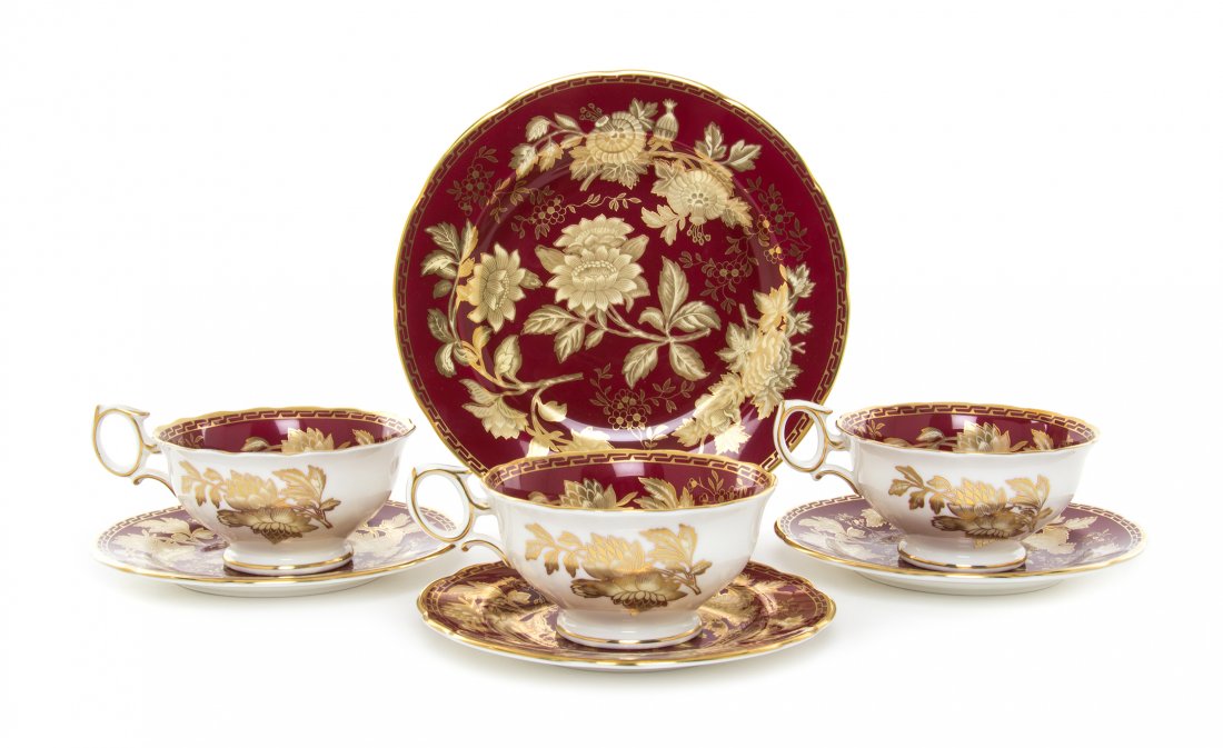 A Wedgwood Porcelain Partial Dinner Service, Diameter: A Wedgwood Porcelain Partial Dinner Service, IN THE RUBY TONQUIN PATTERN, comprising twelve dinner plates, twelve salad plates, twelve bread plates and twelve cups and saucers. Diameter of dinner plat