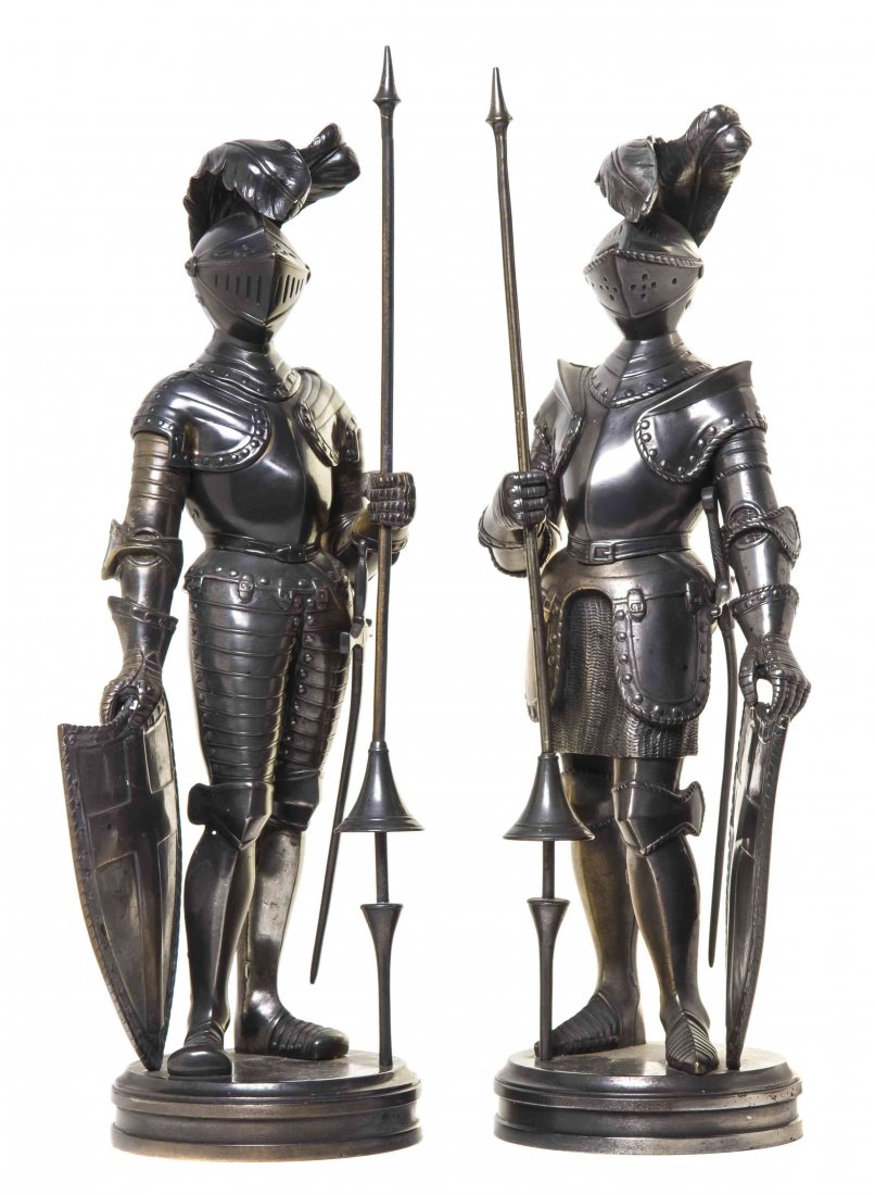 A Pair of Continental Silvered Bronze and Pewter: A Pair of Continental Silvered Bronze and Pewter Figures, each depicting a knight with a shield and a pole arm, raised on a circular base. Height 19 5/8 inches. Property from the Collection of Alan Fr