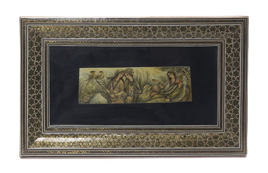 A Persian Miniature Painting on Ivory, Width of: A Persian Miniature Painting on Ivory, 20TH CENTURY, depicting two pairs of lovers and a pair of birds, set within a micromosaic frame. Width of painting 6 inches. Property from the Estate and Trust o