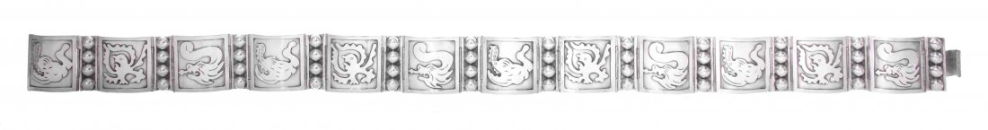 A Mexican Silver Belt, Length 28 1/2 inches.: A Mexican Silver Belt, Maker's Mark CLR or GLR, Iguala, Mid 20th Century, formed as square panels applied with stylized birds, dolphins and dragons spaced by beading, marked on reverse; 7 ozt 10 dwt. 