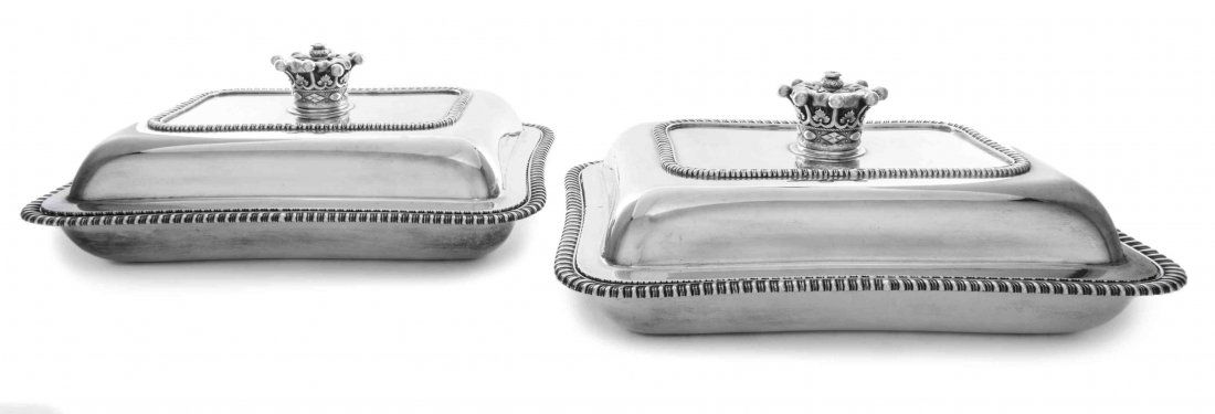 A Pair of George IV Silver Entree Dishes, Length 11 3/4: A Pair of George IV Silver Entree Dishes, Paul Storr, London, 1824, of rectangular cushion form with applied gadrooned borders, the covers with slip-lock silver-plate finials modeled as baron's corone