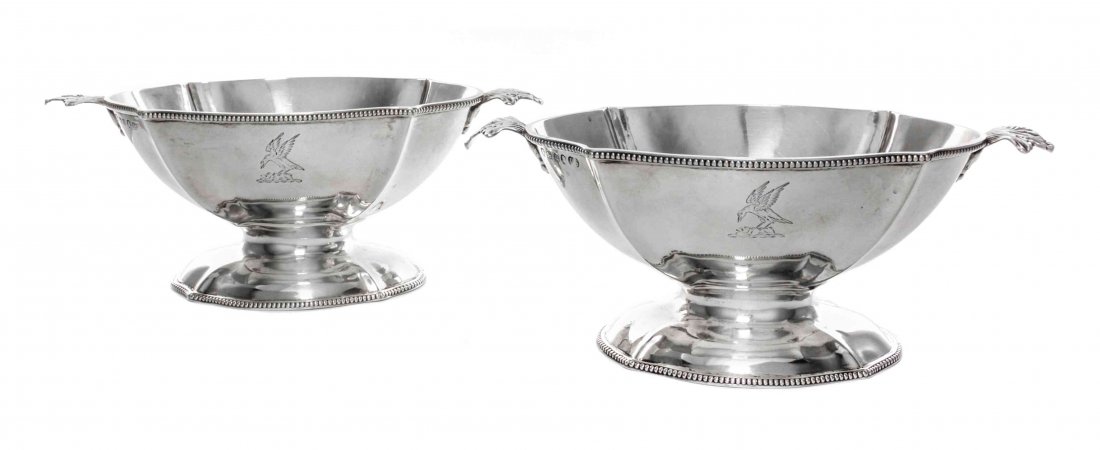 A Pair of George III Silver Open Sauce Boats, Length: A Pair of George III Silver Open Sauce Boats, Paul Storr, London, 1803, of paneled oval form on conforming domed bases, applied with beaded borders, the ends with everted acanthus handles springing fr