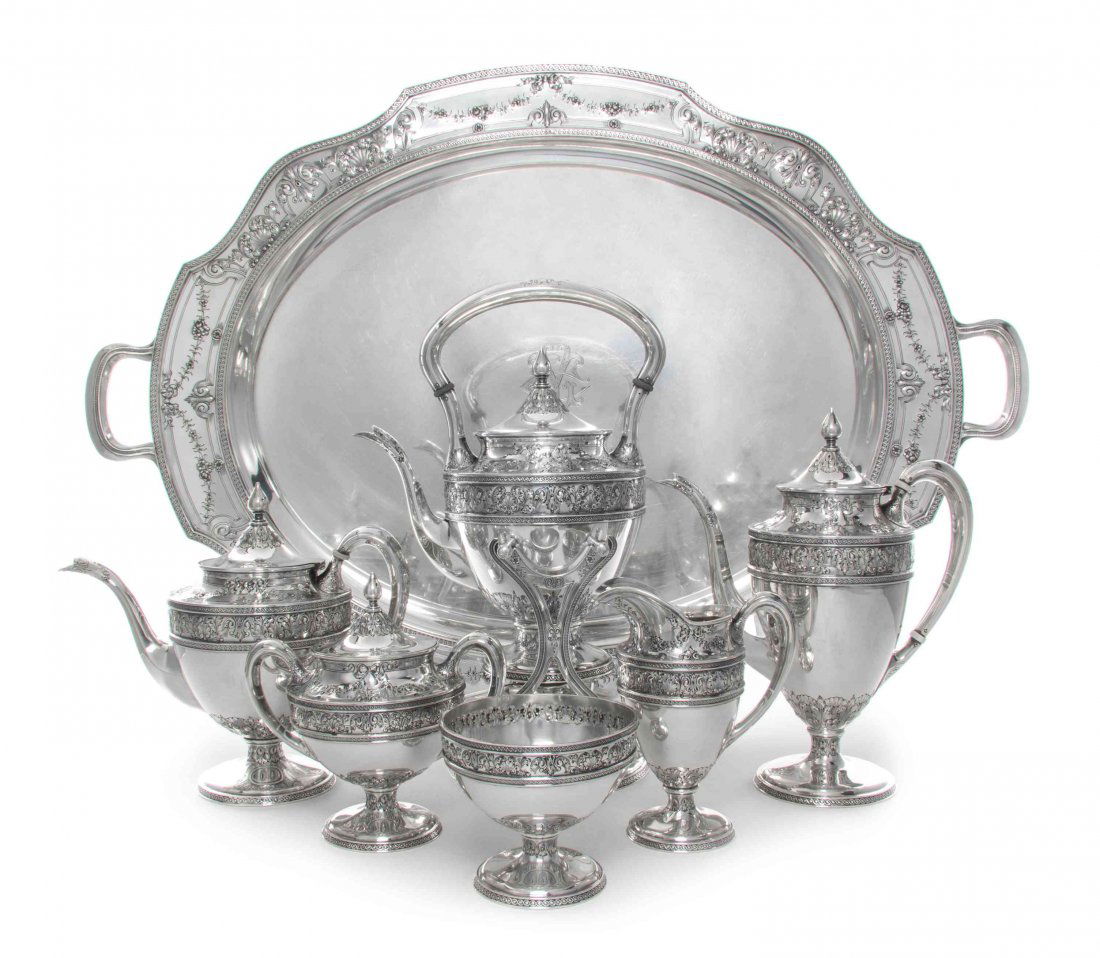 An American Silver Six-Piece Tea and Coffee Set with: An American Silver Six-Piece Tea and Coffee Set with Matching Tray, Barbour Silver Co., Hartford, CT, Early 20th Century, comprising a teapot, coffee pot, kettle on lampstand, creamer, covered sugar b