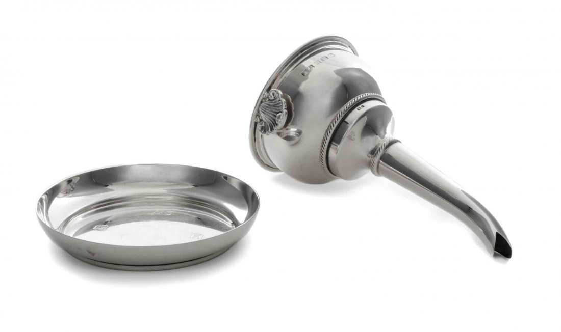 An English Silver Wine Funnel, Height of funnel 5 3/8: An English Silver Wine Funnel, R.E. Porter, Birmingham, 1960, together with a coaster, Frank Cobb & Co., Sheffield, 1984; 4 ozt 10 dwt. Height of funnel 5 3/8 inches. Property from the Estate of David