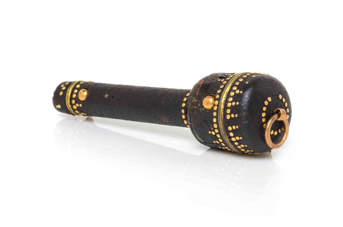 A Continental Shagreen Thimble and Needle Case, Length: A Continental Shagreen Thimble and Needle Case, 19TH CENTURY, opening at each end, with nail head decoration throughout. Length 3 1/2 inches.