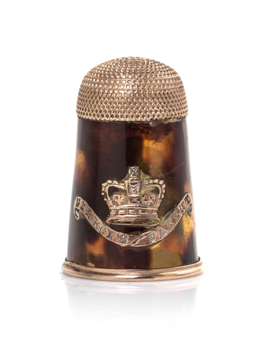 A Rare Regency Rose Gold and Tortoise Shell Piercy's: A Rare Regency Rose Gold and Tortoise Shell "Piercy's Patent" Thimble, JOHN PIERCY, LONDON, CIRCA 1816, the tortoise shell body applied on one side in rose gold with Royal arms and supporters above st