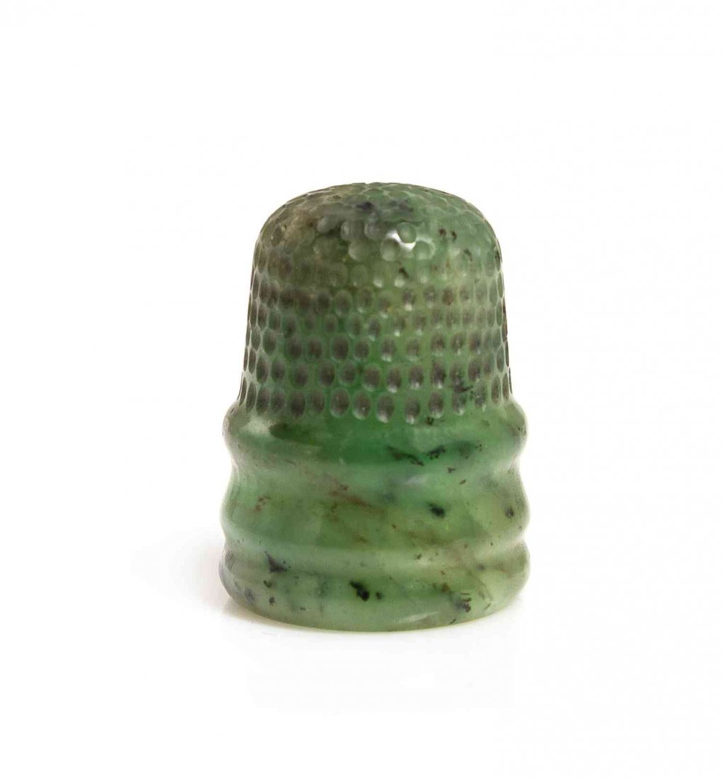 A Chinese Spinach Jade Thimble, Height 7/8 inch.: A Chinese Spinach Jade Thimble, 20TH CENTURY, of typical form. Height 7/8 inch.
