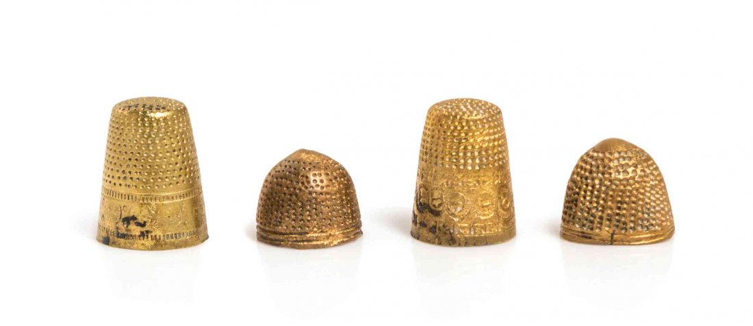 Five Continental Gilt Metal Thimbles, Height of tallest: Five Continental Gilt Metal Thimbles, 15TH/16TH CENTURY, of various forms, two having foliate decorated bands. Height of tallest 7/8 inch.