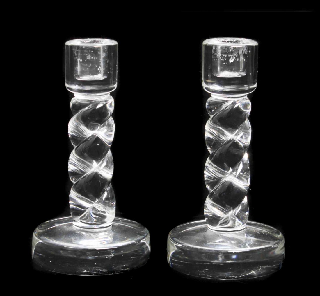 A Pair of Steuben Glass Twist Crystal Candlesticks,: A Pair of Steuben Glass Twist Crystal Candlesticks, designed by George Thompson (American b. 1939) Height 8 1/2 inches. Property from the Estate of Betty Whiting, Highlands Ranch, Colorado