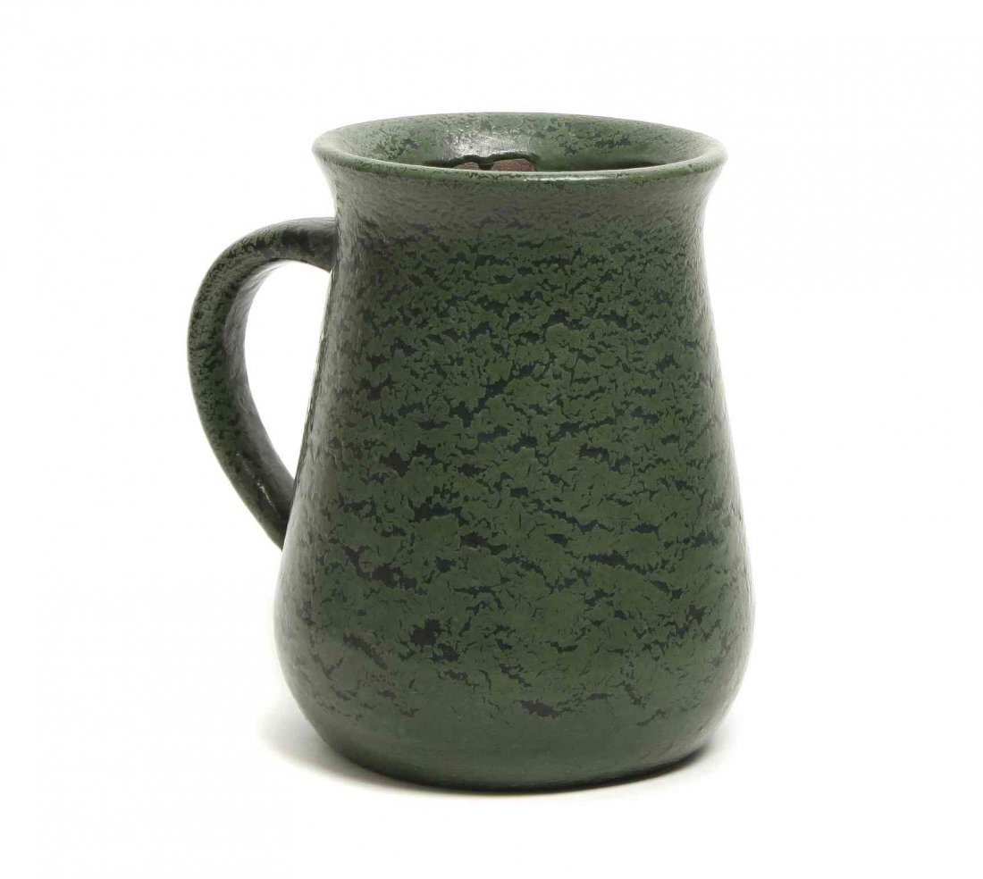 A Merrimac Ceramic Company Vase, Height 6 7/8 inches.: A Merrimac Ceramic Company Vase, having a handle and green glaze, impressed Merrimac under a fish with paper label. Height 6 7/8 inches. Property from the Estate of Alan D. Katz, Boulder, Colorado