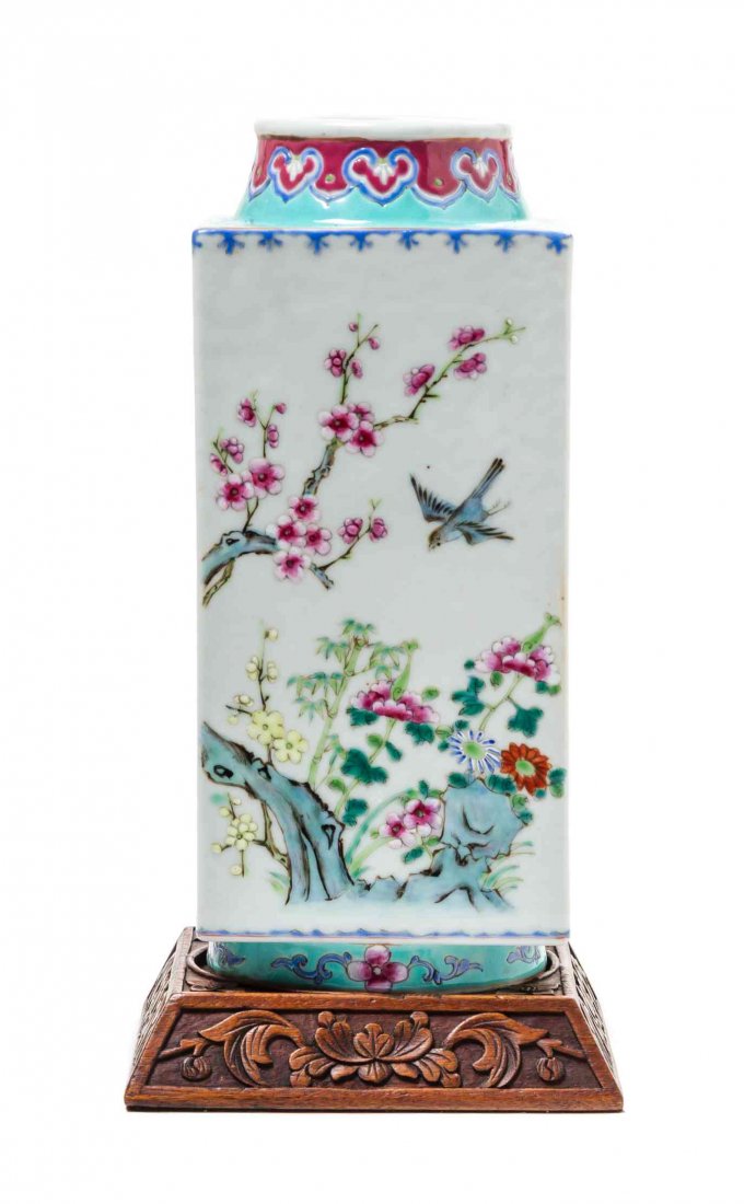 A Chinese Polychrome Enamel Porcelain Vase, Height 11: A Chinese Polychrome Enamel Porcelain Vase, 19th Century of cong form, with ruyi above turquoise enamel at the neck and shoulder, the squared body depicting scenes of birds and butterflies with lotus,