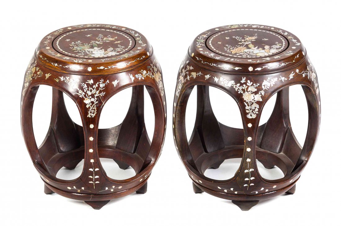 A Pair of Chinese Mother-of-Pearl Inlaid Garden Seats,: A Pair of Chinese Mother-of-Pearl Inlaid Garden Seats, each of barrel form, the circular top depicting a pair of peacocks, with flowering peonies emerging from rocks, within a scalloped border and fol