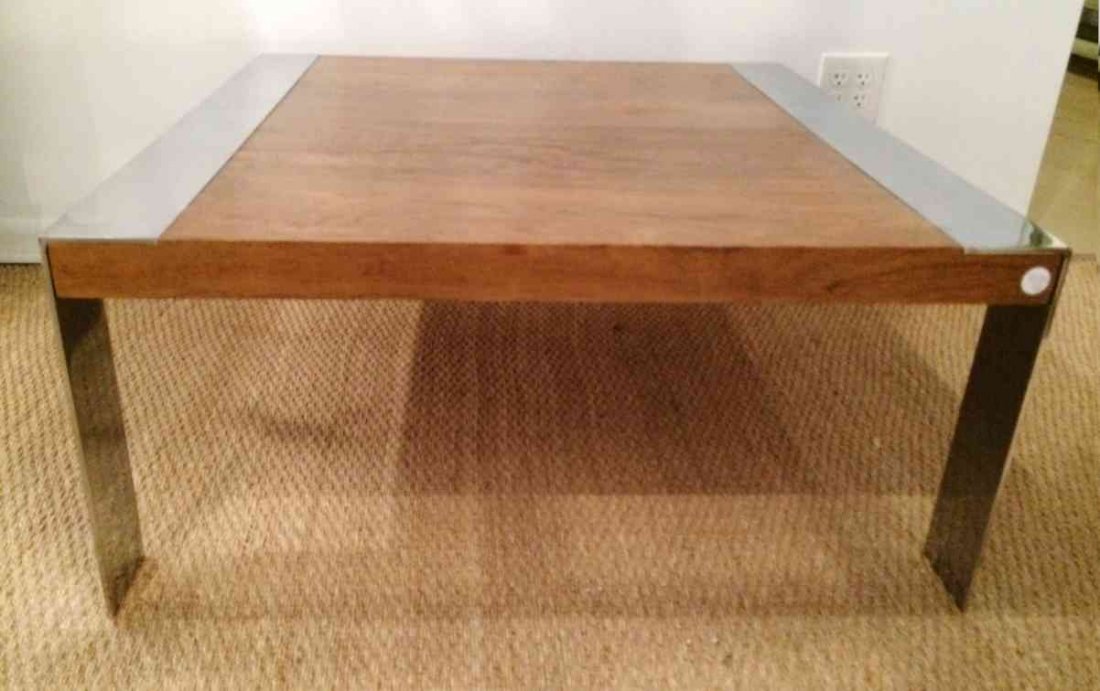 A Milo Baughman Chrome and Rosewood Low Table, Height: A Milo Baughman Chrome and Rosewood Low Table, together with an associated end table. Height 16 x width 36 x depth 36 inches.