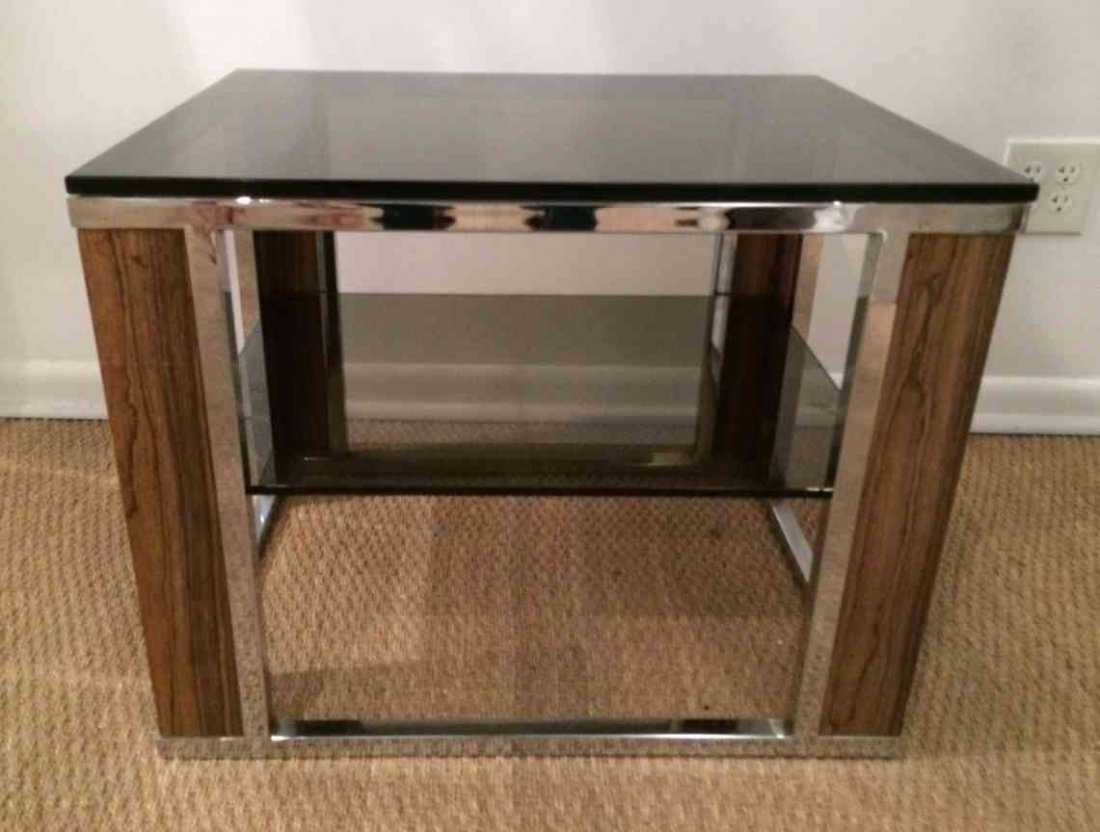 A Rosewood and Lucite Occasional Table, in the style of: A Rosewood and Lucite Occasional Table, in the style of Milo Baughman. Height 20 x width 26 x depth 20 inches.