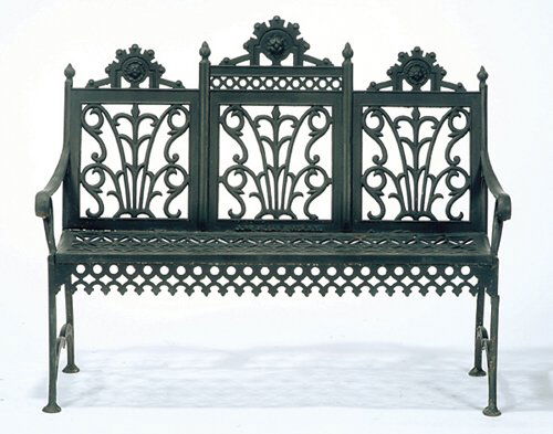 CAST-IRON GARDEN BENCH Cast "John McLean: CAST-IRON GARDEN BENCH Cast "John McLean Maker, N.Y., N. Y.," late 19th c. The three-part back cast the medallions and scrolling devices above a pierced seat with Gothic openwork apron, shaped legs. H