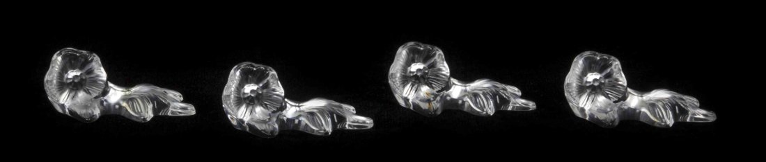 A Set of Fourteen Lalique Molded and Frosted Glass: A Set of Fourteen Lalique Molded and Frosted Glass Knife Rests, Kyoto, designed by Marie Claude Lalique in 1990, with fitted boxes. Width 3 1/2 inches. Property from the Frank Plevo Trust, Las Vegas,