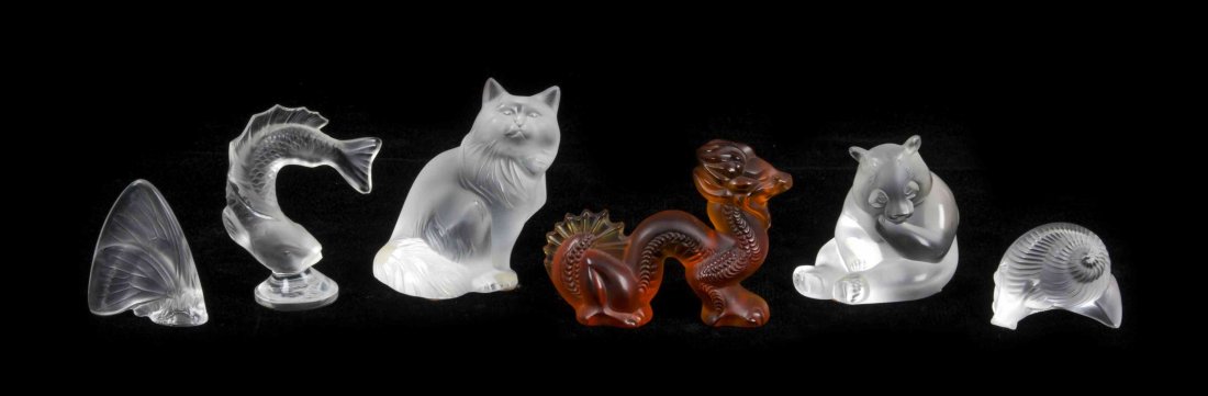 Six Lalique Molded and Frosted Glass Figures, Height of: Six Lalique Molded and Frosted Glass Figures, in various patterns, comprising a seated cat, a panda bear, a snail, a fish, a dragon and an insect, each etched Lalique R France. Height of tallest 3 1/8
