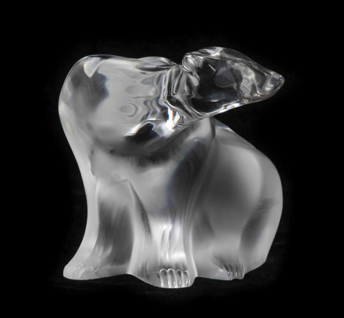 A Lalique Molded and Frosted Glass Figure, Width 8 1/2: A Lalique Molded and Frosted Glass Figure, depicting a polar bear, etched Lalique R France. Width 8 1/2 inches. Property from the Frank Plevo Trust, Las Vegas, Nevada Condition: Appears to be in overa
