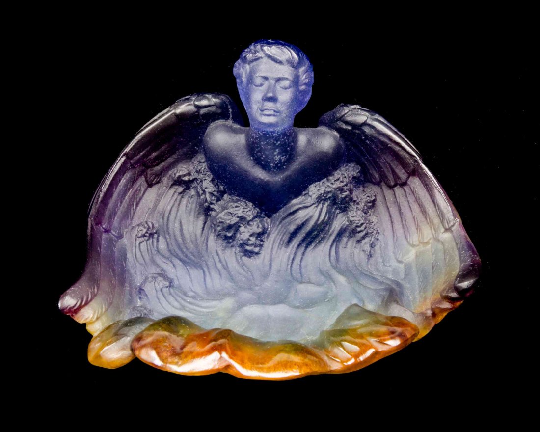 A Daum Pate-de-Verre Vide Poche, Width 5 5/8 inches.: A Daum Pate-de-Verre Vide Poche, depicting an angel, etched Daum France, with a fitted box. Width 5 5/8 inches. Property from the Frank Plevo Trust, Las Vegas, Nevada Condition: Appears to be in overa