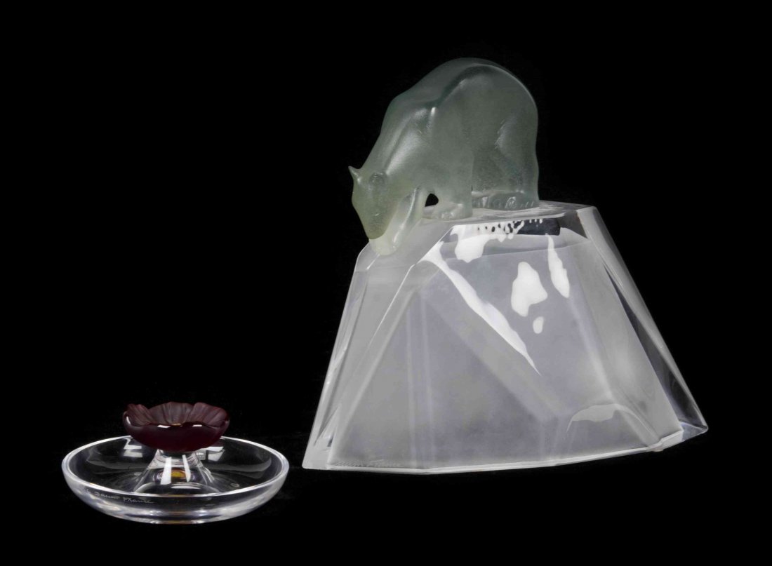 A Daum Pate-de-Verre Figural Group, Height of first 10: A Daum Pate-de-Verre Figural Group, depicting a polar bear on a glacier, etched Daum France, together with a Daum floral ring dish. Height of first 10 inches. Property from the Frank Plevo Trust, Las
