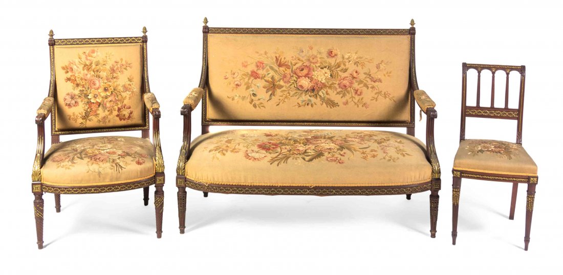 A Louis XV Style Tapestry Upholstered and Gilt Metal: A Louis XV Style Tapestry Upholstered and Gilt Metal Mounted Mahogany Parlor Suite, comprising a settee, a fauteuil and a side chair. Height of fauteuil 38 1/2 inches. Property from the Chicago Histor