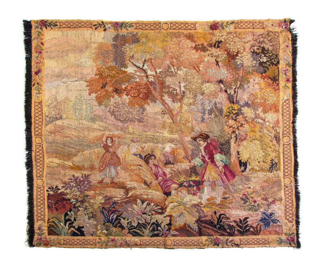 A German Wool Tapestry, Height 54 1/2 x width 59: A German Wool Tapestry, worked to show figures within a wooded landscape, having a lattice and floral decorated border. Height 54 1/2 x width 59 inches. Property from the Collection of Jane Schaefer, 