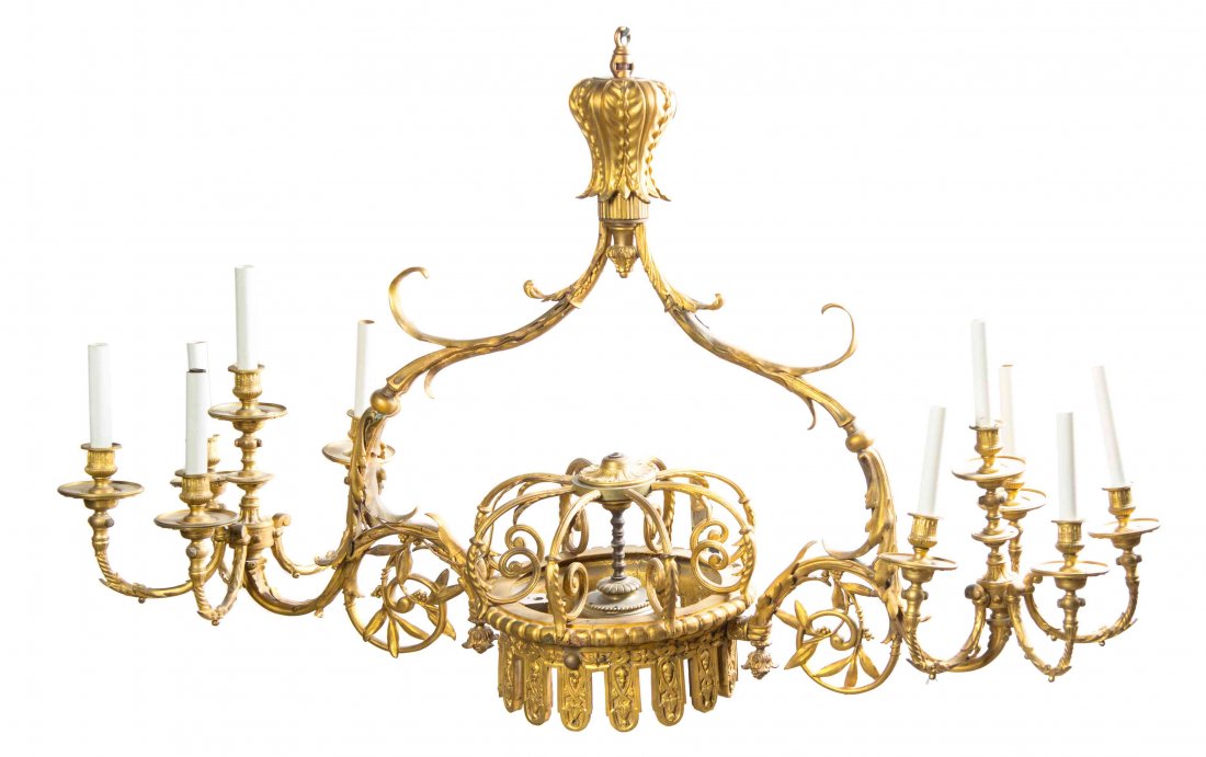 A Gilt Bronze Eleven-Light Billiard Fixture, Height 32: A Gilt Bronze Eleven-Light Billiard Fixture, having a central lighting element with scrolling foliate candle arms at the sides. Height 32 x width 53 inches. Property from the Estate of a Prominent Mid