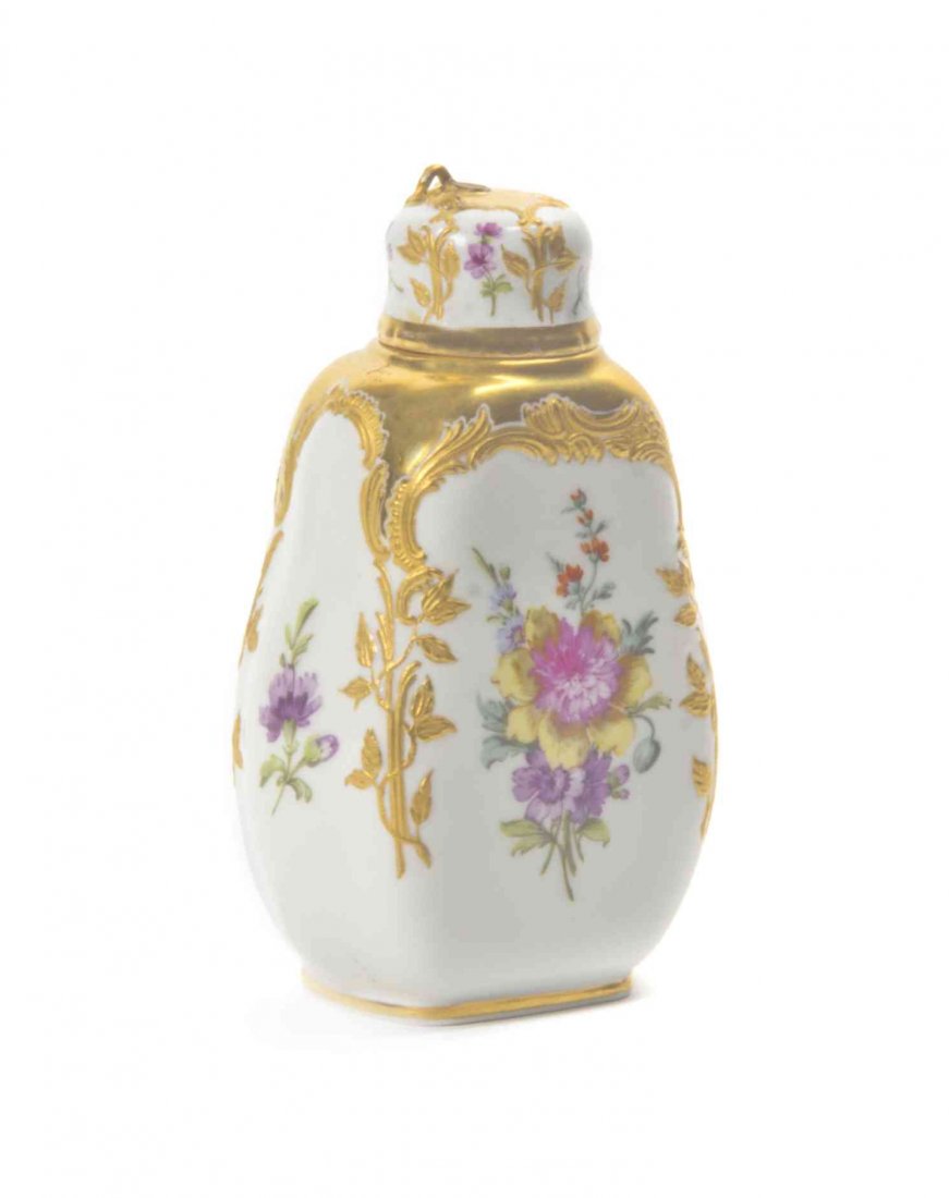 A Berlin (K.P.M.) Porcelain Scent Bottle, Height 4/34: A Berlin (K.P.M.) Porcelain Scent Bottle, of tapering rectangular form, having polychrome floral and gilt decoration. Height 4/34 inches.