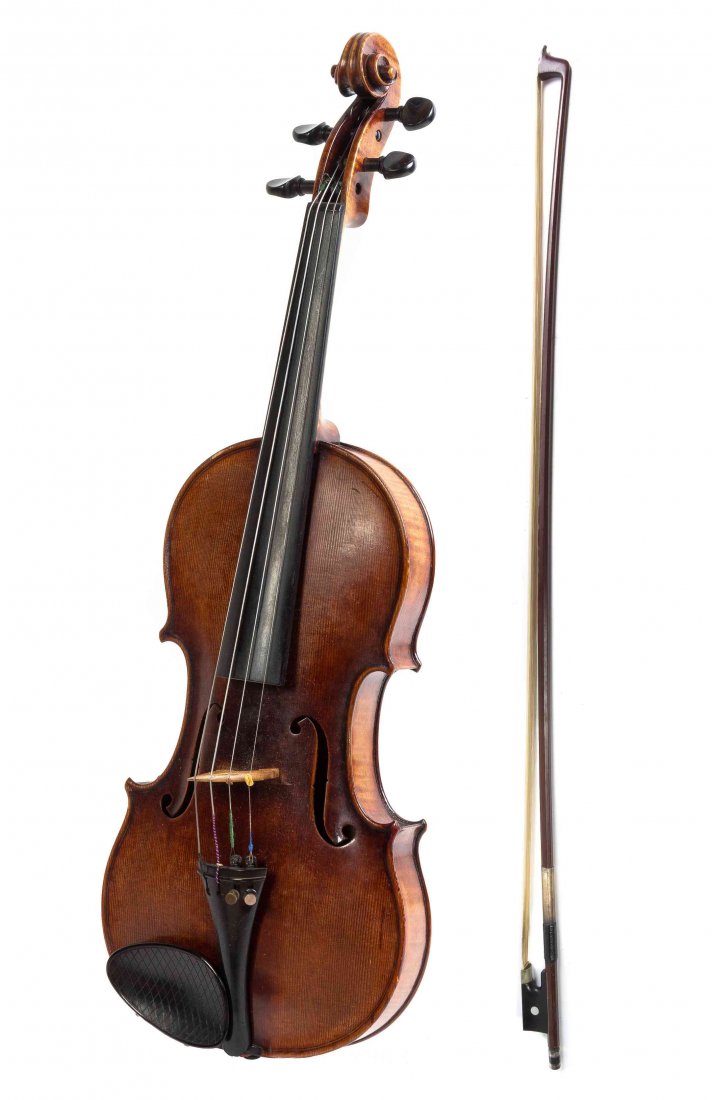 A German Violin, G.A. PFRETZSCHNER, Length of back 14: A German Violin, G.A. PFRETZSCHNER, together with a violin bow, signed Prell at base of bow. Length of back 14 inches, length of bow 28 1/2 inches.
