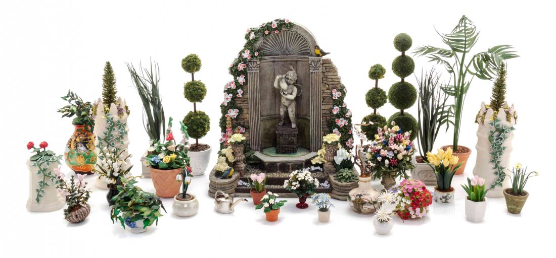 A Collection of Garden Items, Height of tallest 5 1/2: A Collection of Garden Items, comprising a variety of flowers, plants, pots, jardinieres, statues, watering pots and a fountain, 97 items total. Height of tallest 5 1/2 inches. Property from the Estat