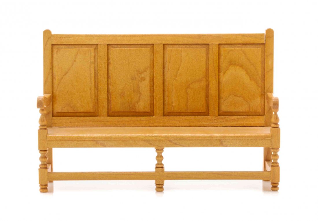 An English Style Settle, Height 4 x width 8 1/8 x depth: An English Style Settle, GERALD CRAWFORD, having a rectangular back and seat within open arms, raised on turned legs joined by stretchers. Height 4 x width 8 1/8 x depth 2 inches. Property from the Co