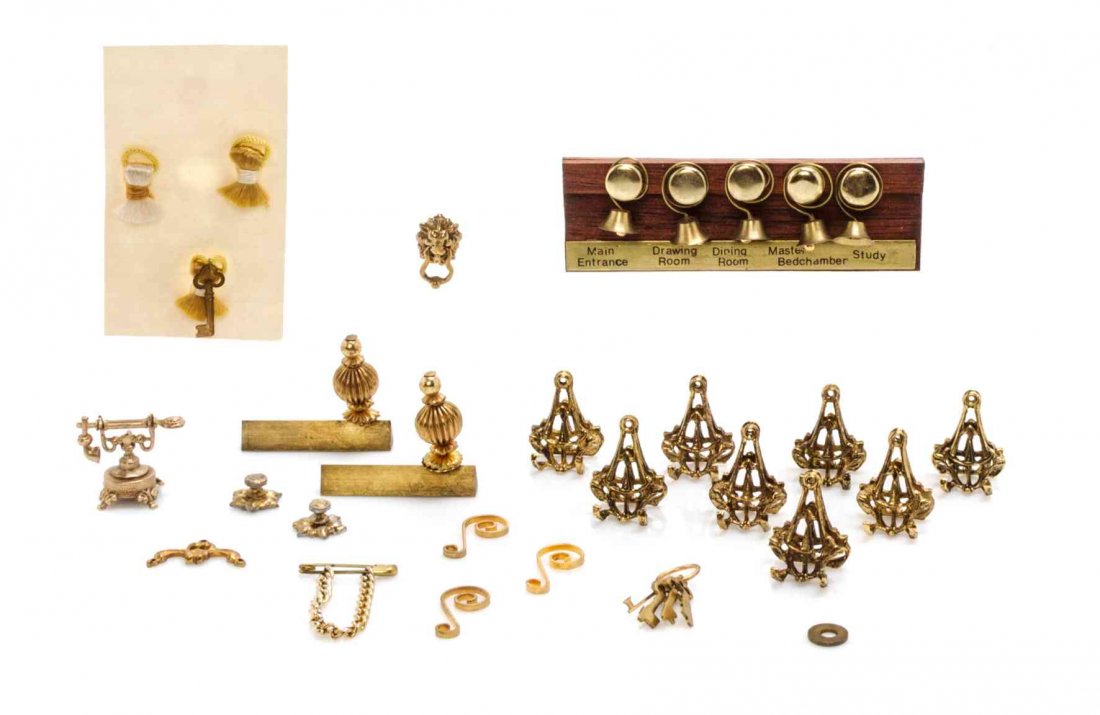 A Collection of Plate Racks and Assorted Hardware,: A Collection of Plate Racks and Assorted Hardware, comprising eight plate racks, two door knockers, four door knobs, eight keys, three tassels, a pair of chenets, a telephone, a wall mount of servant'
